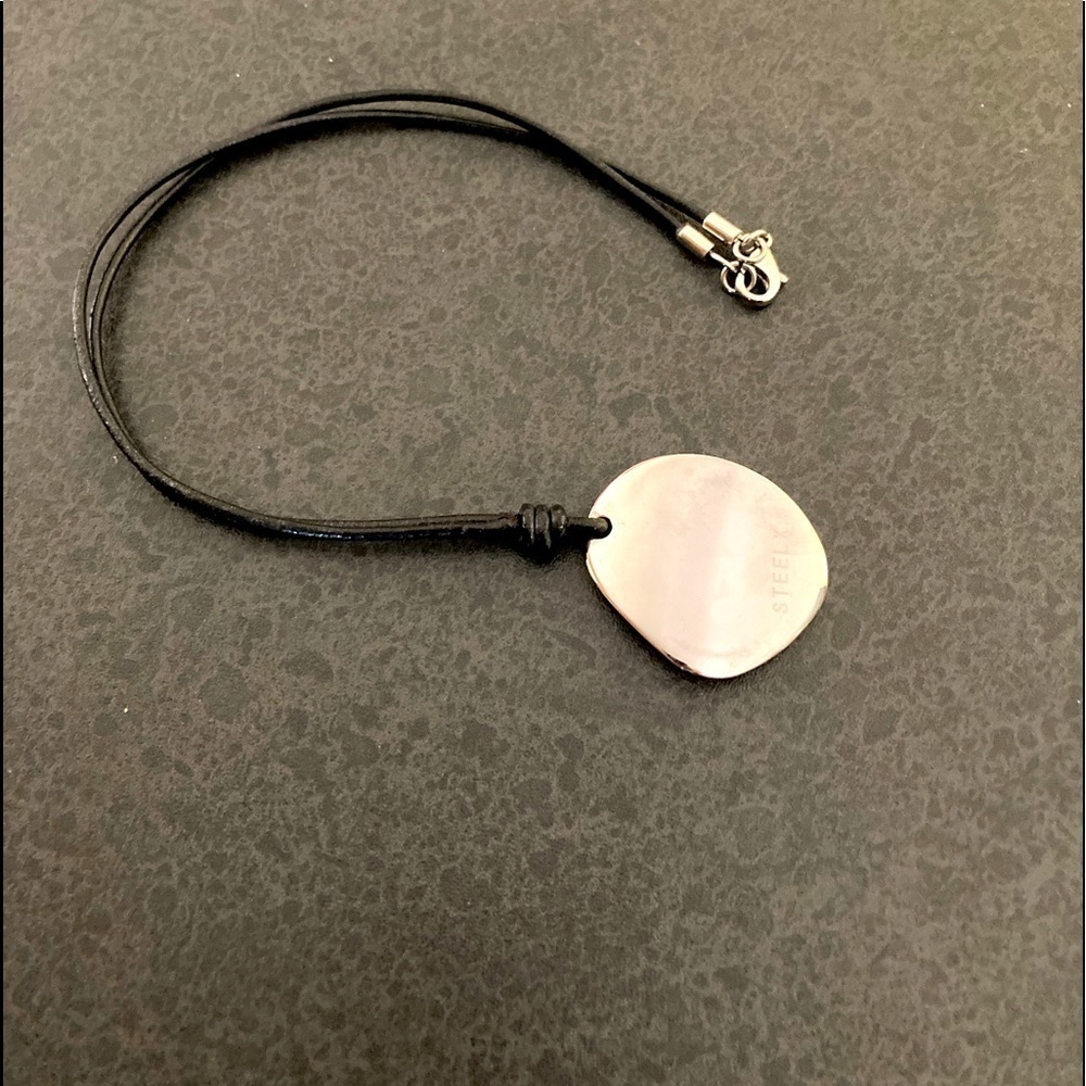 Men or women’s Pendant on Leather Cord  by Steelx excellent condition 20” cord